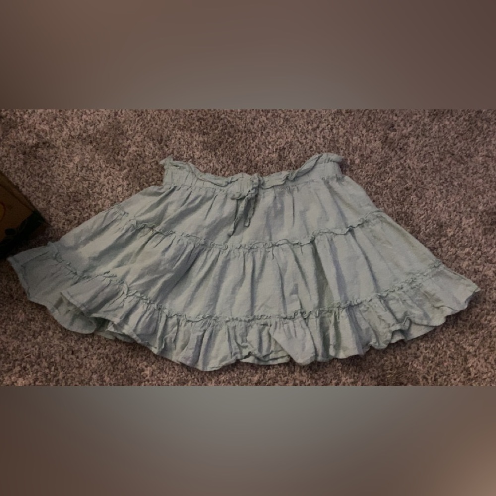 Light green ruffled skirt